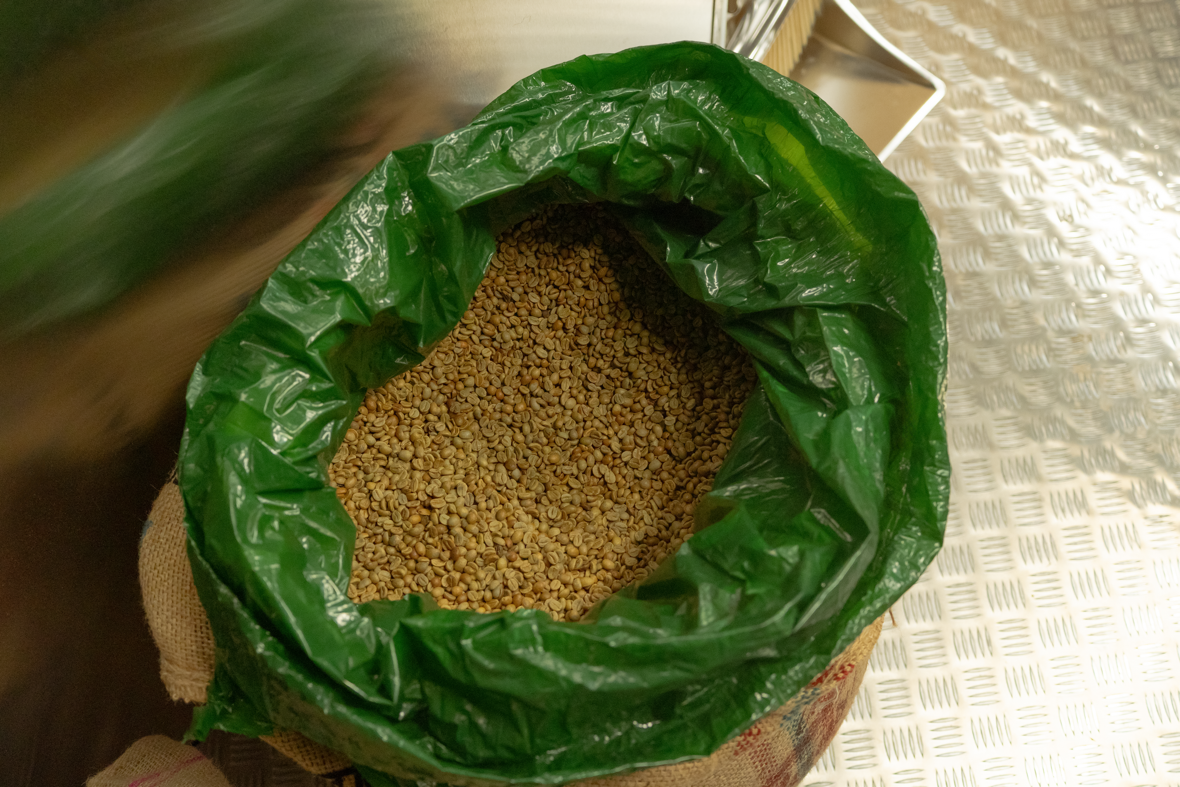 Green coffee beans in a sack at Flatcoffee roastery in Dublin